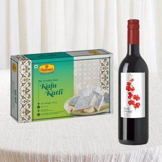 Bottle of red wine with Box of half kg kaju katli sweets 