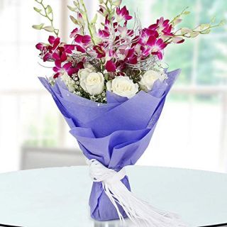 Bouquet of 10 white roses with 6 lavender orchids 