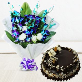 Bouquet of blue orchids with white roses with chocolate cake 