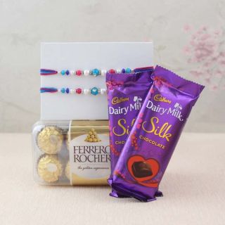 Box of 16 pcs rocher ferrero chocolates, 2 dairy milk silk, 2 rakhi 