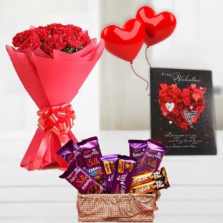 Bunch of 10 red carnations, 2 heart shape balloons , valentine day card, basket of assorted silk cadburies75star chocolates 