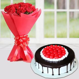 Bunch of 12 red carnations with premium black forest cake with cherry topping 