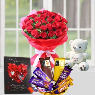 bunch of 12 red roses with basket of assorted chocolates, greeting card with 6 inch white teddy bear 
