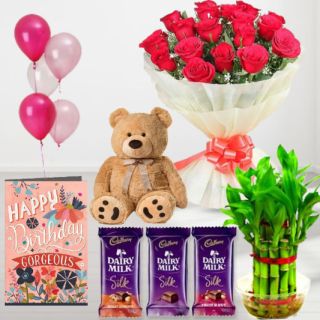Bunch of 10 red roses, set of 3 dairy milk silk chocolates, 6 inch height teddybear , 2 layer Lucky bamboo plant ,5 blown balloons with birthday greeting card
