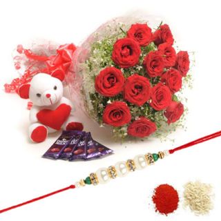 Bunch of 20 red roses with 6 inch teddy bear with 4 dairy milk cadburies with 1 rakhi and roli chawa