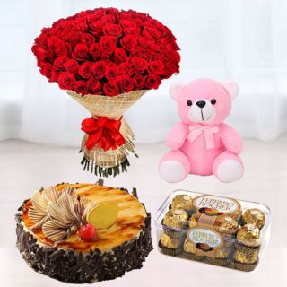 bunch of 50 red roses, 6 inch teddybear, irish coffee cake,16 pcs rocher ferrero chocolates 