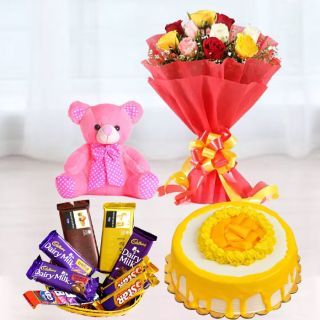 Bunch of mix colour roses, basket of assorted chocolates, 6 inch pink teddy bear , mango premium quality cake 