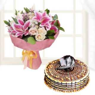 Bunch of mix flowers with butterscotch cool cake 