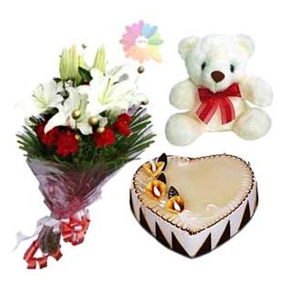 bunch of white lilies with red carnations with heart shape butterscotch cake with 6 inch teddybear