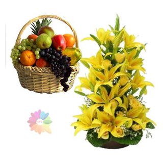 Exotic 2 feet height lilies arrangement with 3 kg seasonal mix fruits basket 