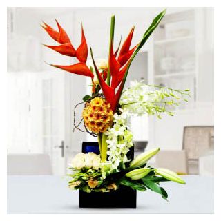Exotic Designer Arrangement of Mix flowers including Hibiscus, lilies, orchids roses