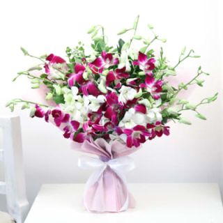 Exotic hand bouquet  of 15 lavender and white orchids 
