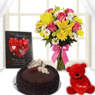 Exotic mix flowers arranged in glass vase, half kg choco chips cake, valentine greeting card, 6 inch teddybear