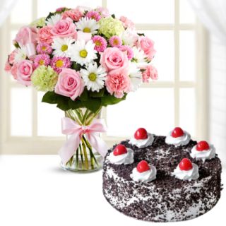 Exotic vase arrangement of mix flowers with roses, gerberas, carnations & black forest cool cake 