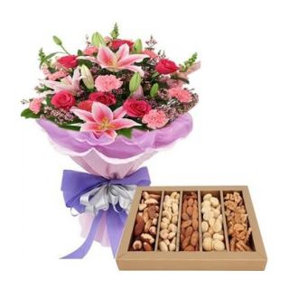 bunch of mix flowers with assorted dryfruits
