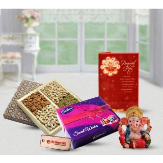 Assorted Dry fruits, Celebration box of chocolates, Ganesha Idol with Diwali greeting card