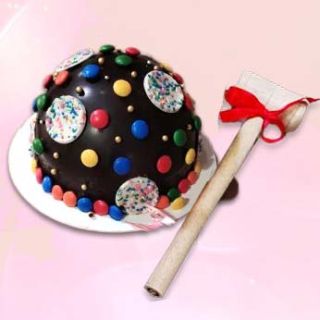 Half kg chocolate pinata cake with gems topping 