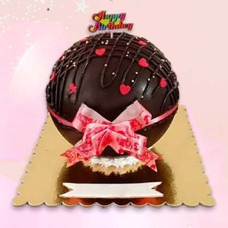 Half kg Double chocolate pinata cake with red hearts fondant topping 