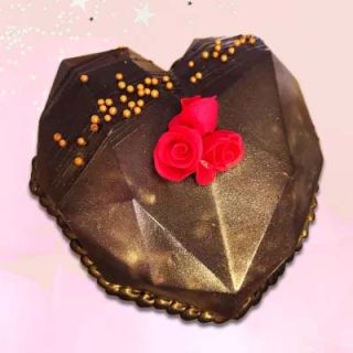 Half kg Heart shape pinata chocolate cake with red roses on top 