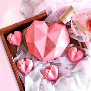 Half kg heart shape strawberry pinata cake with set of 4 mini pinata cake 