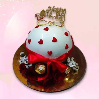 Half kg vanilla with rocher ferrero pinata cake 