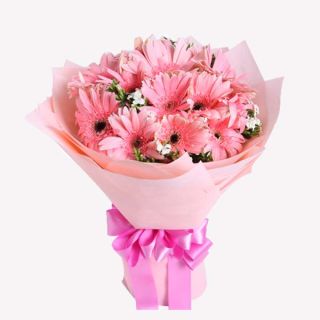 Hand bouquet of 12 pink gerberas 
