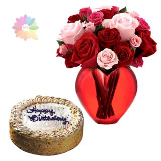 red and pink roses arranged in glass vase with 1 kg butterscotch cake 