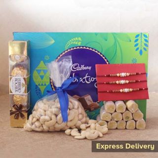 set of 3 rakhi , 4 pcs rocher ferrero chocolate, 200 grams kaju roll sweet, 250 grams cashew with box of celebration chocolates