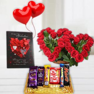 Twin heart shape red roses arrangement , greeting card, 2 heart ahape balloons with basket of assorted chocolates 