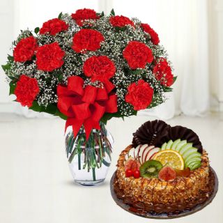 vase arrangement f 15 red carnations with premium butterscotch fruit cake 