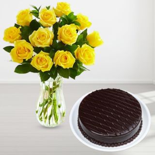 Vase arrangement of 10 yellow  roses with chocolate cake 