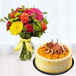 Vase arrangement of 12 mix flowers with honey cool cake 