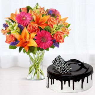 vase arrangement of 15 mix flowers with choco vanilla cool cake 