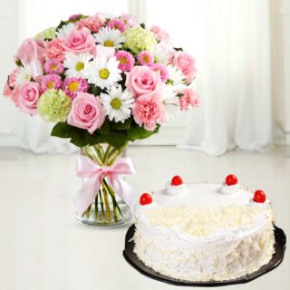 vase arrangement of 15 mix flowers with white forest cake 