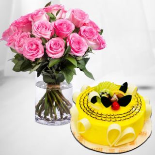Vase arrangement of 15 pink roses with premium quality pineapple cool cake 