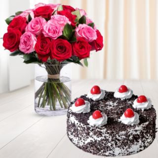 Vase arrangement of 15 red and pink roses with black forest cool cake