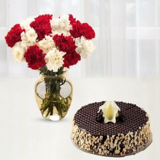 Vase arrangement of 15 red and white carnations with chocolate walnut cake 