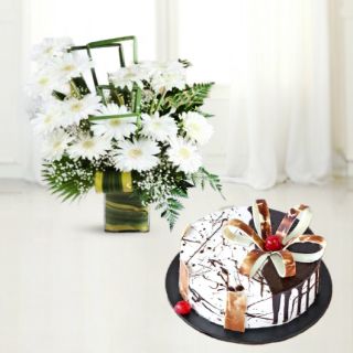 Vase arrangement of 15 white gerberas with choco vanilla cool cake 