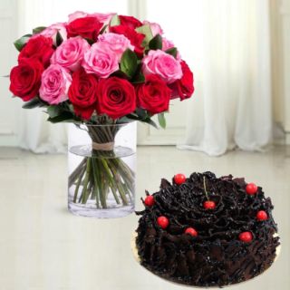Vase arrangement of 20 red and pink roses with half kg chocolate fantasy cool cake 