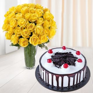 Vase arrangement of 30 yellow roses with black forest cool cake 