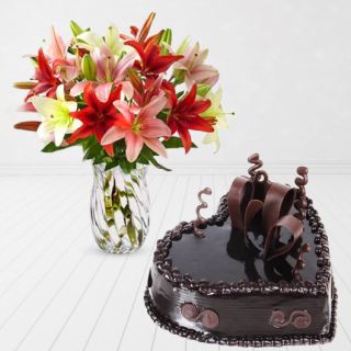 Vase arrangement of 5 mix colour lilies with heart shape chocolate truffle cake 