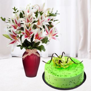Vase arrangement of 5 pink lilies with kiwi cool cake 