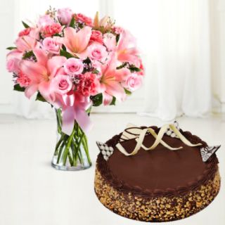 Vase arrangement of exotic mix flowers with chocolate almond cool cake 