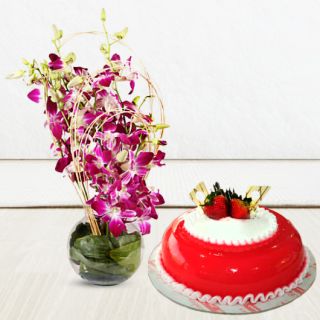 Vase Arrangement of lavender orchids with  strawberry cake 