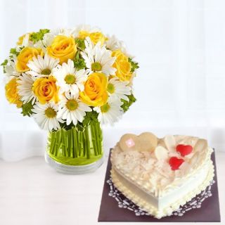 Vase arrangement of yellow roses&white gerberas with heart shape white forest cool cake 