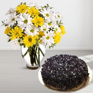 Vase Arrangement of yellow and white gerberas with chocolate cake