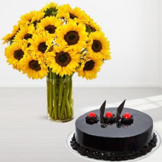 vase arrangement of 20 yellow gerberas with chocolate truffle cake 