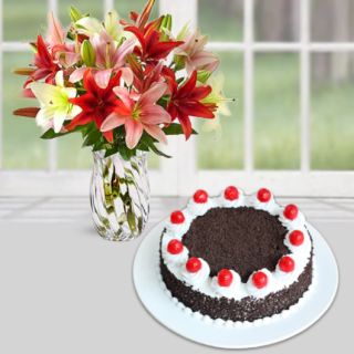 Vase arrangement of 5 mix colour lilies with black forest cake