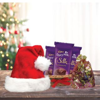 Basket Of 3 Dairy Milk Silk With Santa Cap And Assorted Home Made Chocolates